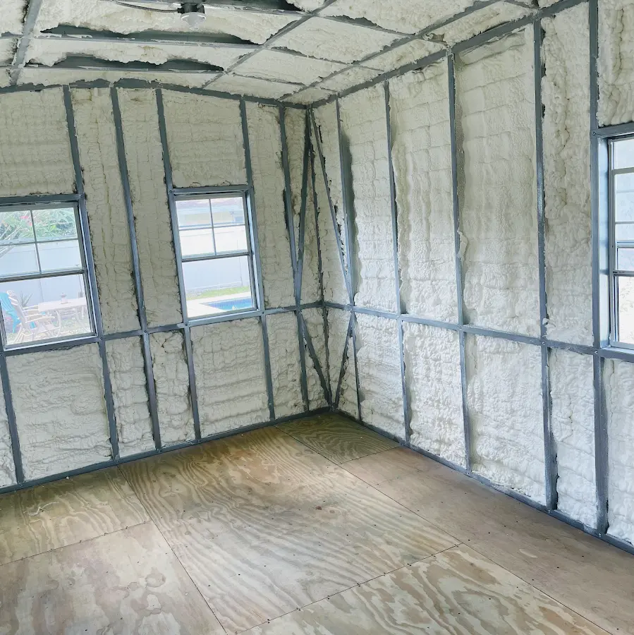 Closed-cell spray foam insulation applied to wall cavities in a residential project in Nephi